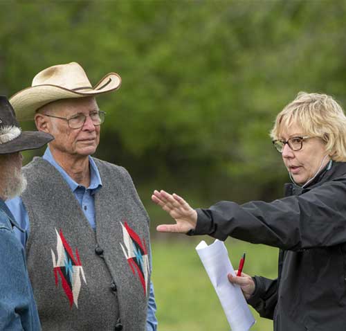 Photos of Olive Talley consulting with Mike Collins and Ben Bradley for a shoot