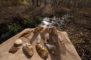 Photo of uncovered artifacts at the Gault Site